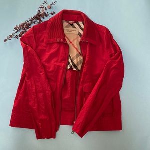 Red vintage Burberry Brit windbreaker.